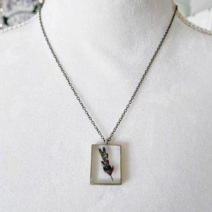 Purple lavender botanical resin necklace in silver bezel